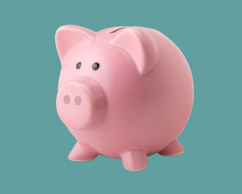 A pink piggy bank with a blue background