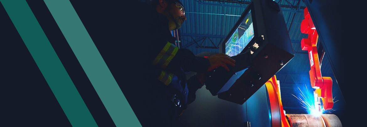 Photo of a man using Tecnar technology for welding